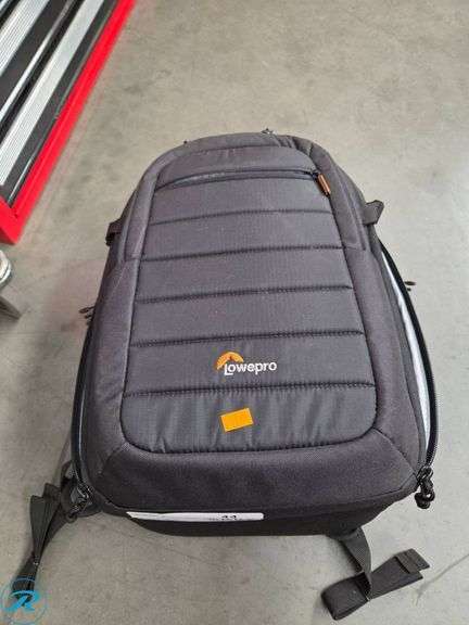 Steve Madden Backpack and Lowepro Camera Bag - Roller Auctions