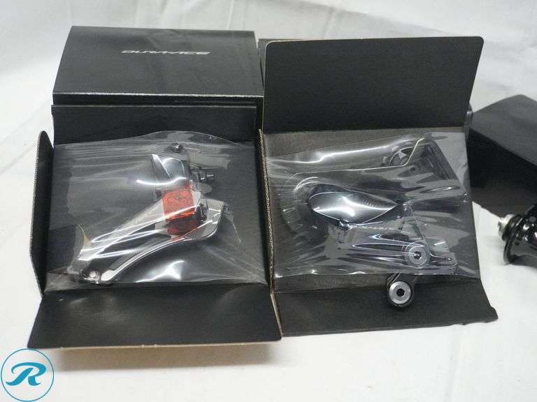 Shimano Dura-Ace FD-R9100 and RD-R9100 Derailleurs, HB-9000 Front Hub, FH-9000 Rear Hubs, and Accessories - Roller Auctions