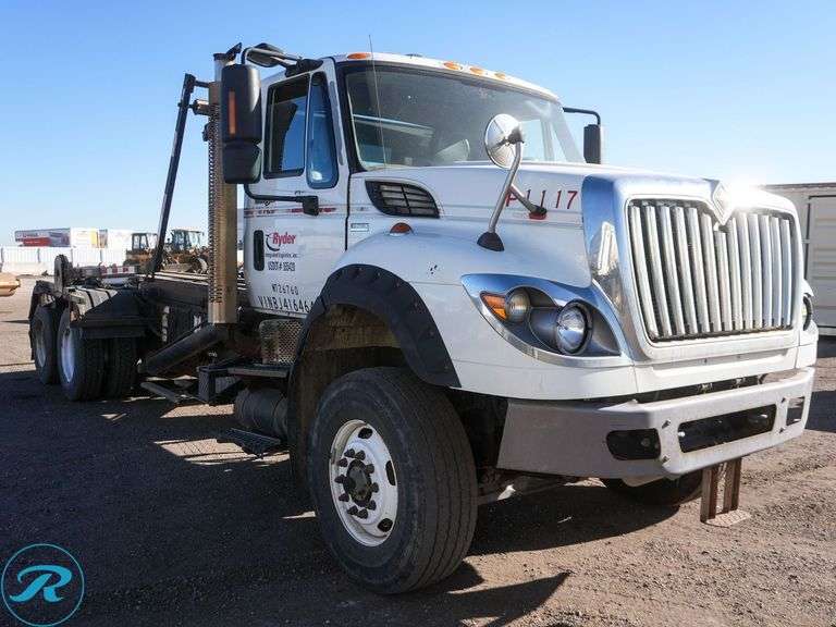 2011  International  Workstar 7600  T/A Rolloff Truck - Roller Auctions