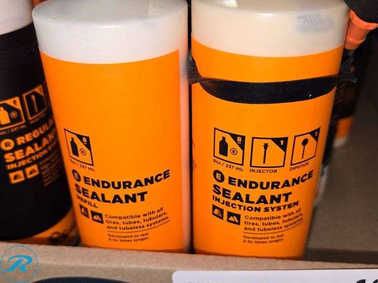 Bottles of Sealants and Lubricants Including Fiberlink and Endurance Sealant - Roller Auctions