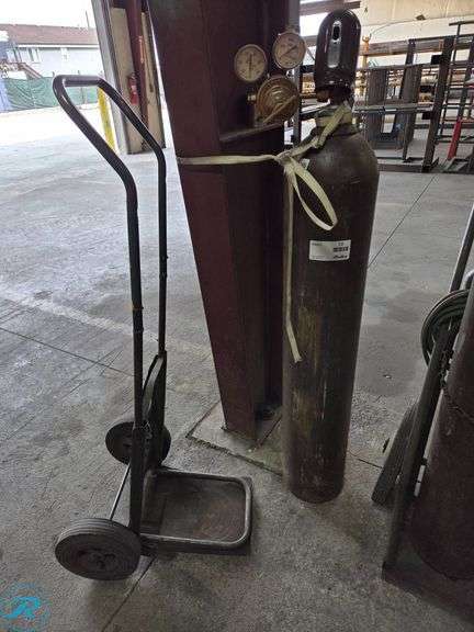 Steel Gas Cylinder with Attached Pressure Gauges and Hand Trolley