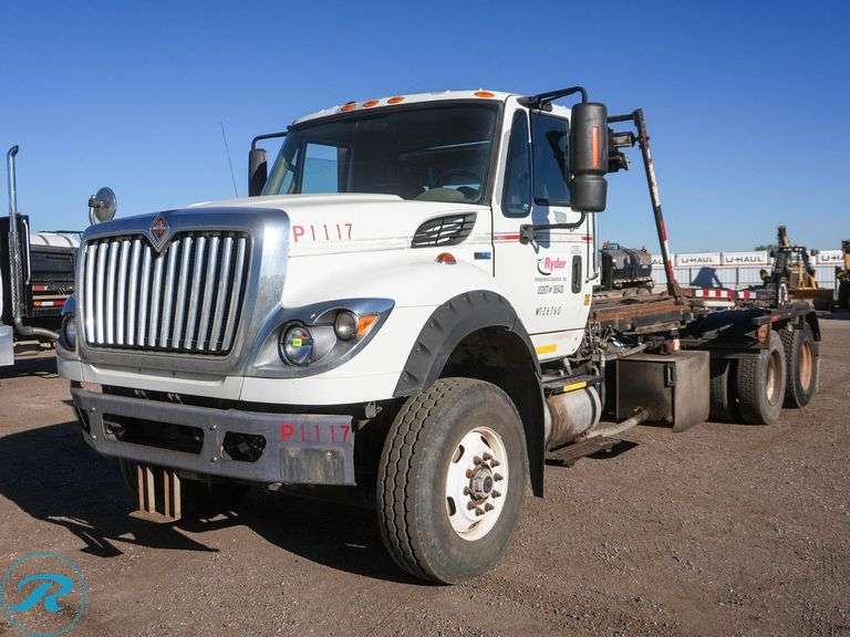 2011  International  Workstar 7600  T/A Rolloff Truck - Roller Auctions