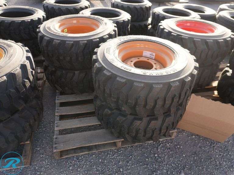 Set of (4) New Forerunner 12-16.5 SKS1 Skid Steer Tires With Wheels, To Fit Case - Roller Auctions