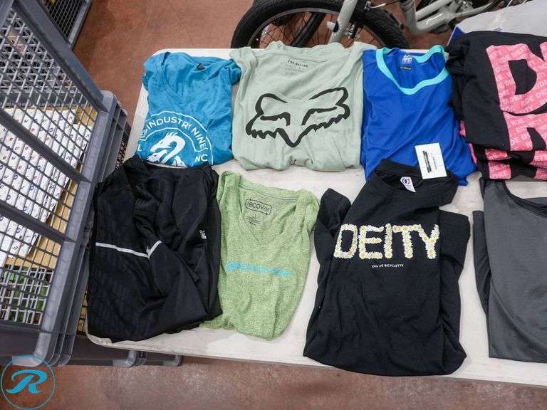 Crate of (26) Women's Cycling Shirts, Size L/XL, Assorted Brands - Roller Auctions