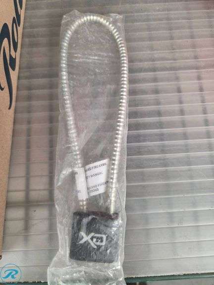 Tactical Gear with Firearm Pouches, Magazines, and Cable Lock - Roller Auctions