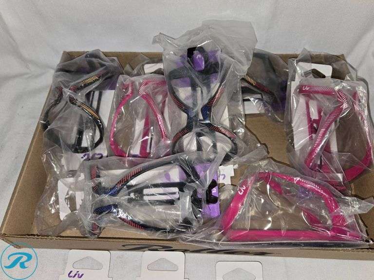 Tray of Liv Branded Bicycle Bottle Cages in Various Colors - Roller Auctions