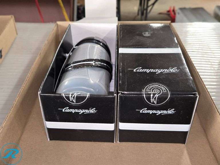 (2) Campagnolo Carbon Water Bottle Cages with Bottles and (2) Carbon Cages - Roller Auctions