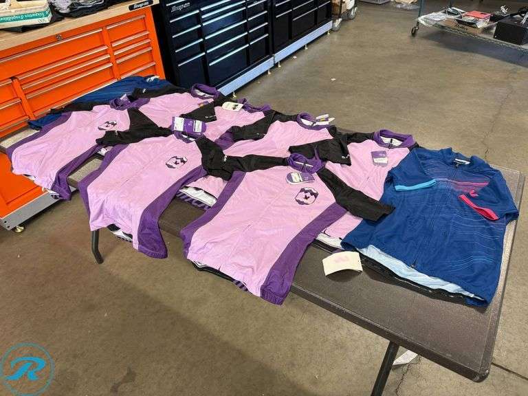 (9) Women’s Cycling Jerseys, Assorted Sizes (Stained/Dirty) - Roller Auctions