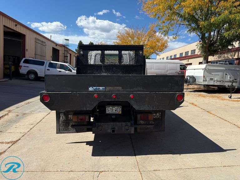 1999  Isuzu  NPR   4X2  Flatbed Dump Truck - Roller Auctions