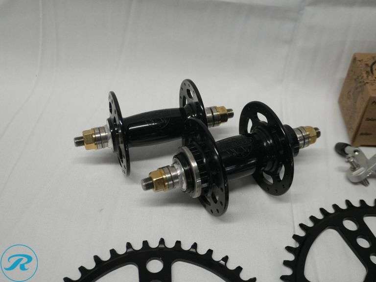 White Industries Bicycle Components Set with Paul Components Including Hubs, Chainrings, and Crank Arms with ‘The One’ Branding - Roller Auctions