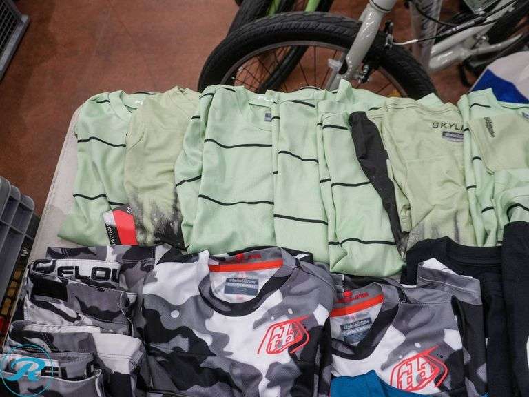 Crate of (47) Youth Cycling Shirts, Assorted Brands and Sizes - Roller Auctions