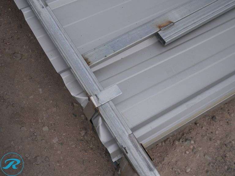 (100) New Sheets of KJ K0311 Galvalume Corrugated Steel Panels, 10' x 35" (Damaged to Top Few Sheets) - Roller Auctions