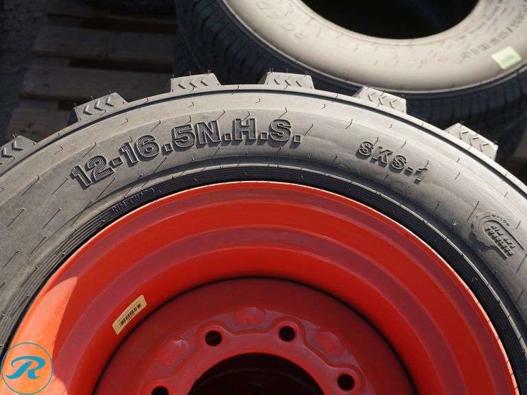 Set of (4) New Forerunner 12-16.5 SKS1 Skid Steer Tires With Wheels To Fit Bobcat - Roller Auctions