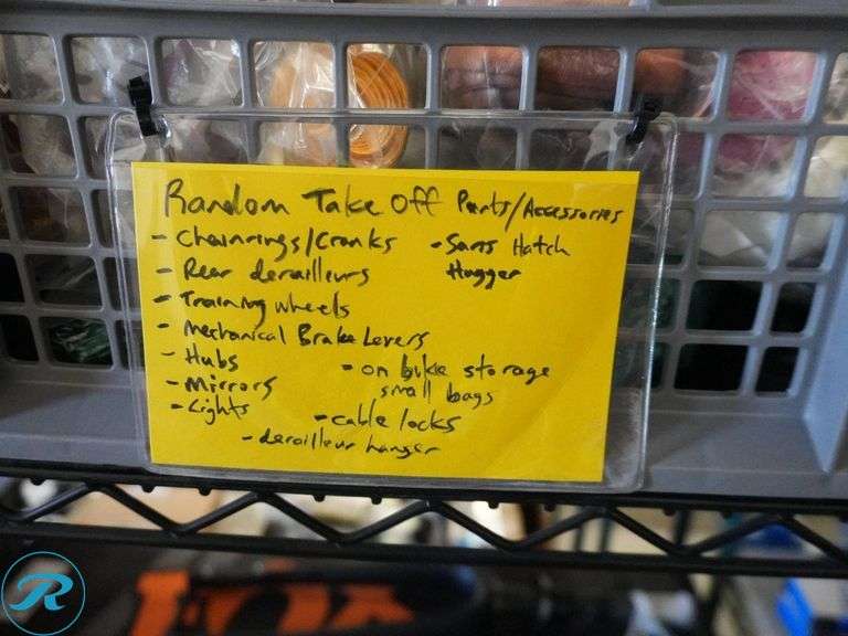 Shelf of Assorted Bicycle Components and Parts - Roller Auctions