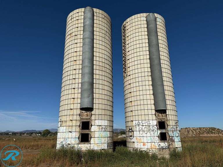 (2) Concrete Stave Silos, 40' Height, 44' Circumference, 14' Internal Diameter, On Concrete Foundations (No Roofs) - Roller Auctions