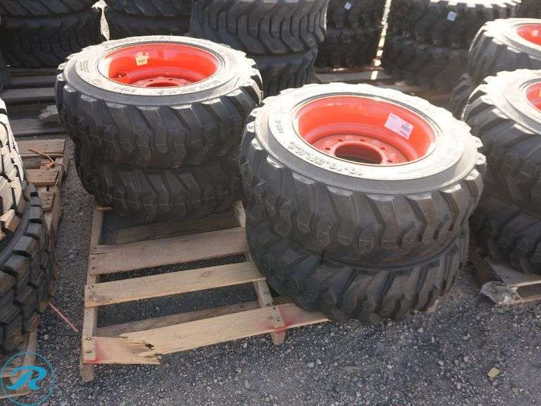 Set of (4) New Forerunner 10-16.5 SKS1 Skid Steer Tires With Wheels, To Fit Bobcat - Roller Auctions