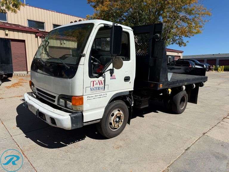1999  Isuzu  NPR   4X2  Flatbed Dump Truck