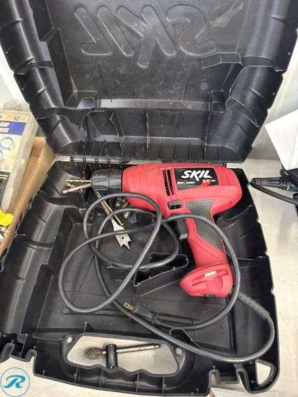 Skil Drill with Hard Case and Assorted Drill Bits - Roller Auctions