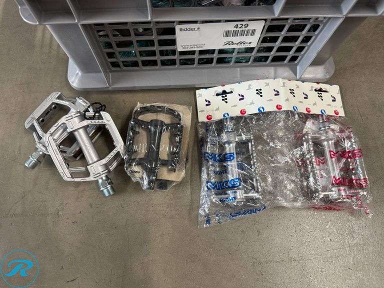 Crate of Assorted Bike Pedals - Roller Auctions