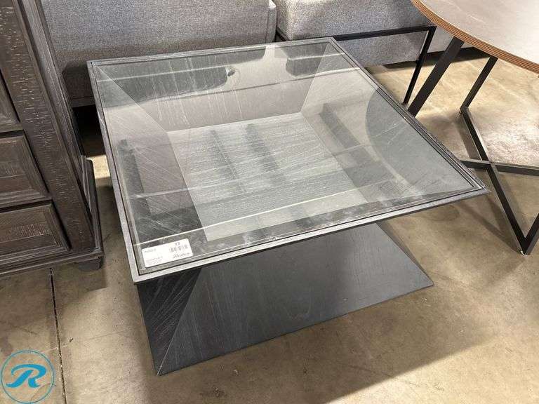 Glass-Top Square Coffee Table With Black Geometric Wood Base, 38″ x 38″ x 18″ - Roller Auctions