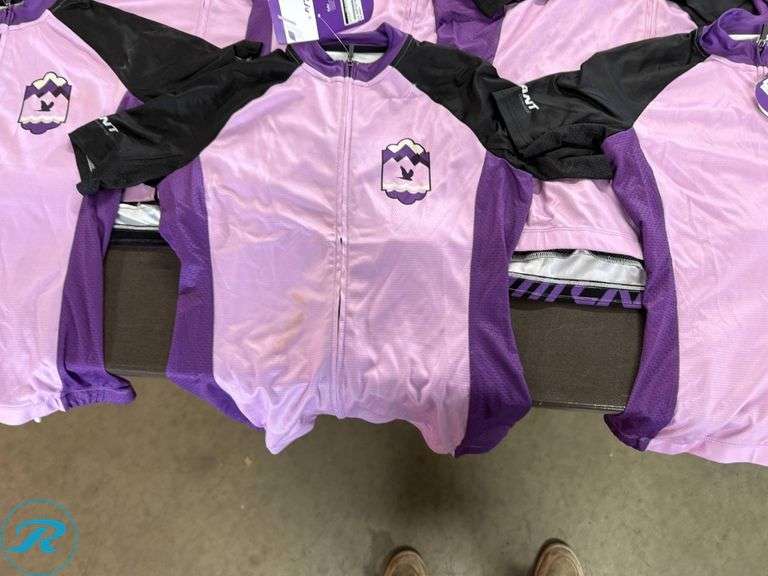 (9) Women’s Cycling Jerseys, Assorted Sizes (Stained/Dirty) - Roller Auctions