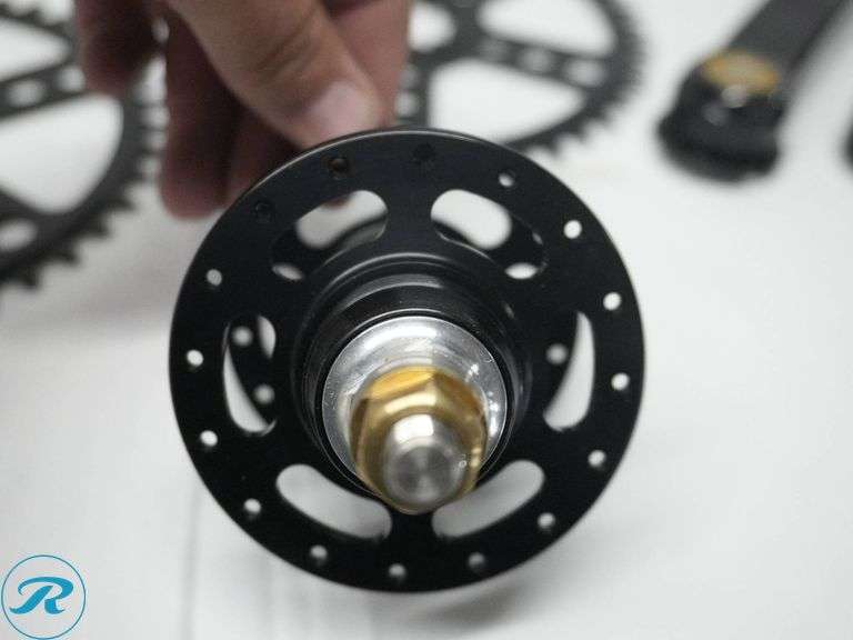 White Industries Bicycle Components Set with Paul Components Including Hubs, Chainrings, and Crank Arms with ‘The One’ Branding - Roller Auctions