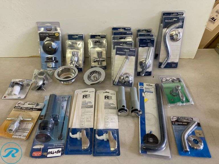 (30) Assorted Accessories and plumbing spare parts, mainly for bathroom and kitchen installation (include shower arms, toilet levers, sink strainers foot lock stop, lift rod and pop up)