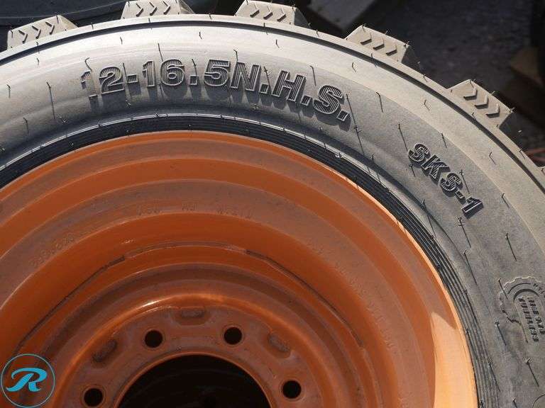 Set of (4) New Forerunner 12-16.5 SKS1 Skid Steer Tires With Wheels, To Fit Case - Roller Auctions