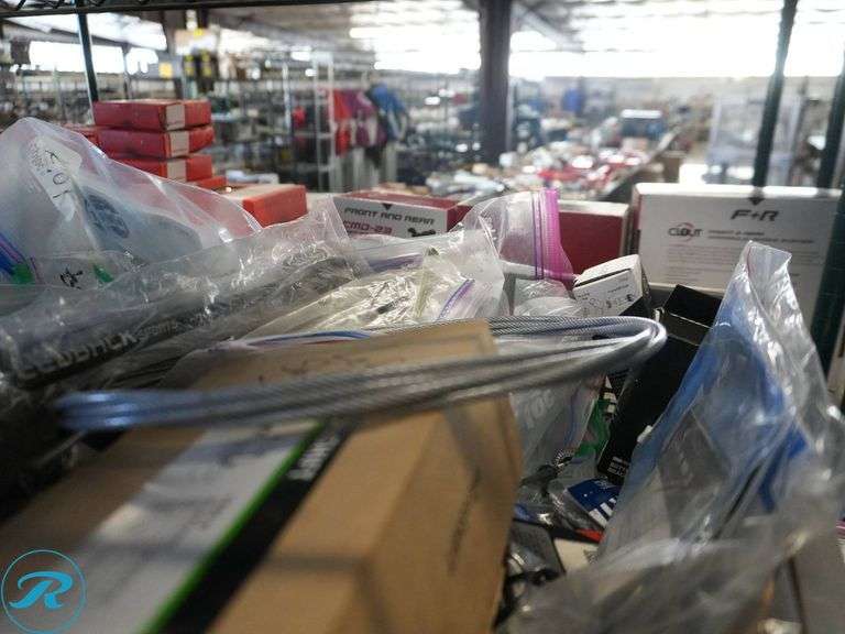 Shelf of Assorted Bicycle Components and Parts - Roller Auctions