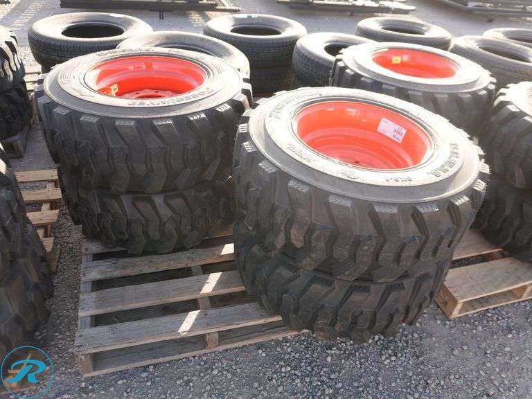 Set of (4) New Forerunner 12-16.5 SKS1 Skid Steer Tires With Wheels To Fit Bobcat - Roller Auctions