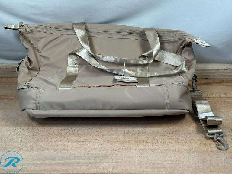 (2) Mytagalongs: Mine. Duffle Bag- (1) New, Tan & (1) New, Black - Roller Auctions