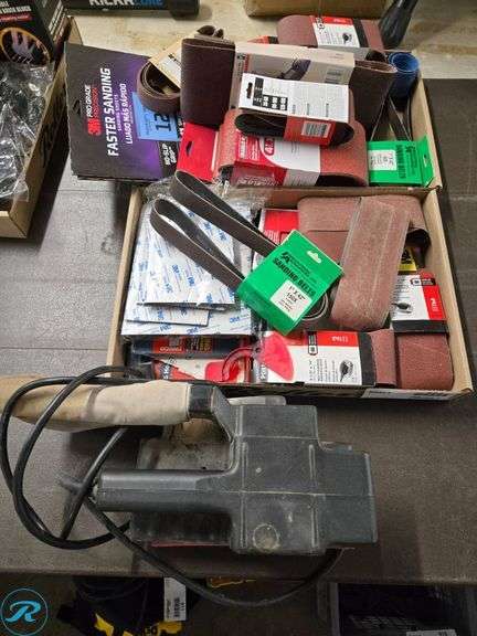 Electric Belt Sander and (2) Trays of Sanding Belts - Roller Auctions