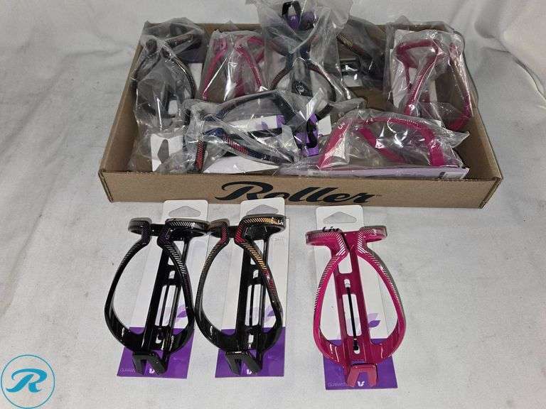 Tray of Liv Branded Bicycle Bottle Cages in Various Colors - Roller Auctions