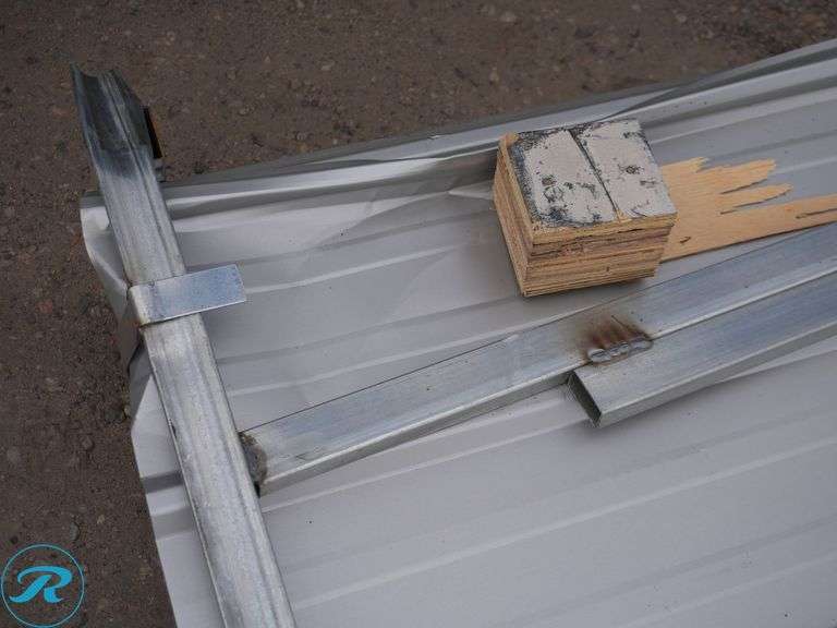 (100) New Sheets of KJ K0311 Galvalume Corrugated Steel Panels, 10' x 35" (Damaged to Top Few Sheets) - Roller Auctions