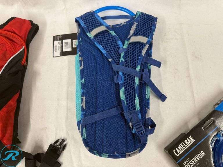 CamelBak XLP Hydration Backpack, Mini M.U.L.E. 50oz Hydration Pack, and Crux 1.5L Reservoir - Roller Auctions