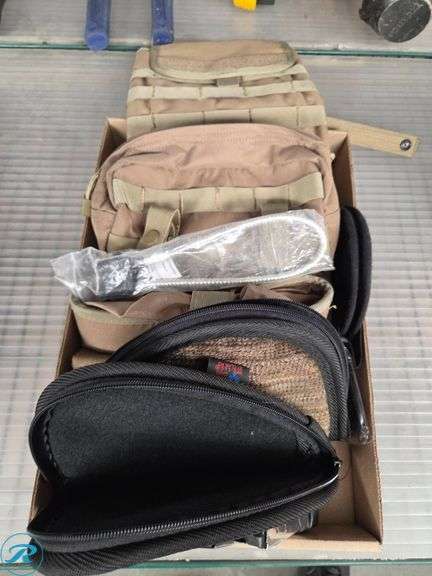 Tactical Gear with Firearm Pouches, Magazines, and Cable Lock - Roller Auctions