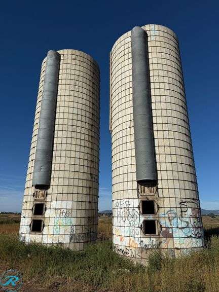 (2) Concrete Stave Silos, 40' Height, 44' Circumference, 14' Internal Diameter, On Concrete Foundations (No Roofs) - Roller Auctions