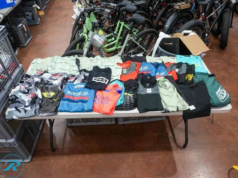 Crate of (47) Youth Cycling Shirts, Assorted Brands and Sizes - Roller Auctions