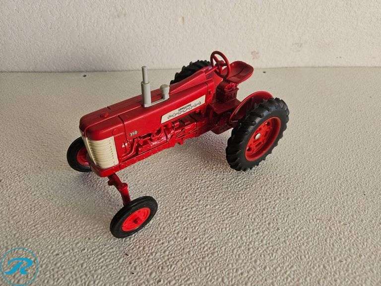 (2) Diecast Model Tractors: McCormick Farmall and International 350 Tractor Models - Roller Auctions
