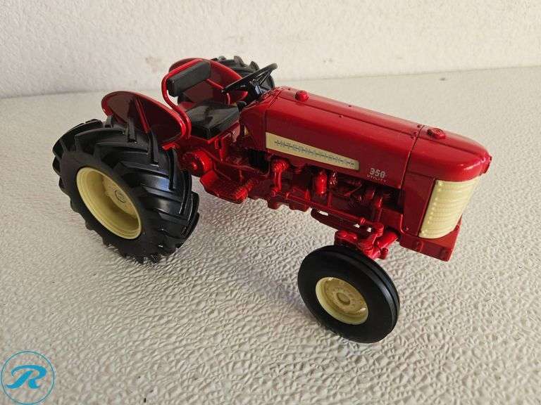 (2) Diecast Model Tractors: McCormick Farmall and International 350 Tractor Models - Roller Auctions
