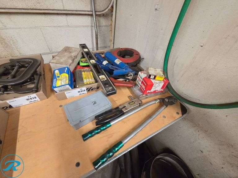Hand Tools Including Pliers, Level, Tape Measures, and Miscellaneous Hardware