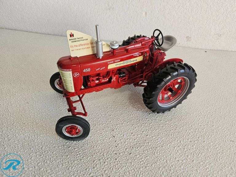 (2) McCormick Farmall Diecast Model Tractors, Models 350 and 450 - Roller Auctions