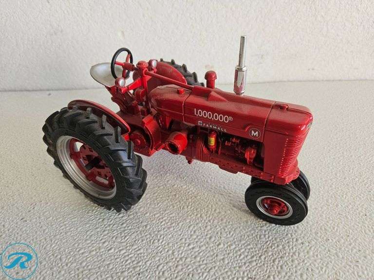 (2) Diecast Model Tractors: McCormick Farmall and Ford Tractor - Roller Auctions