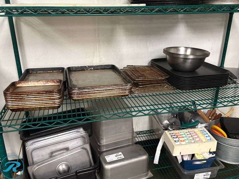 Shelf of Baking Sheets, Cooling Racks, Stainless Steel Bowls, Trays, and Pizza Paddle