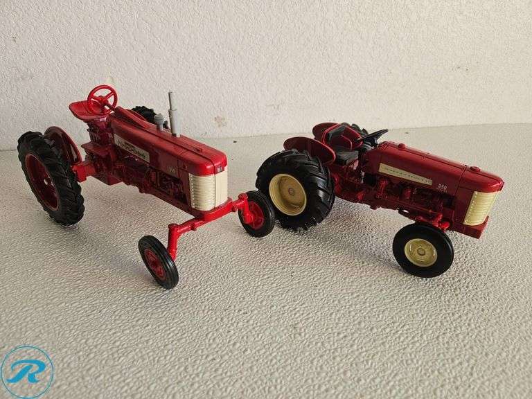 (2) Diecast Model Tractors: McCormick Farmall and International 350 Tractor Models - Roller Auctions