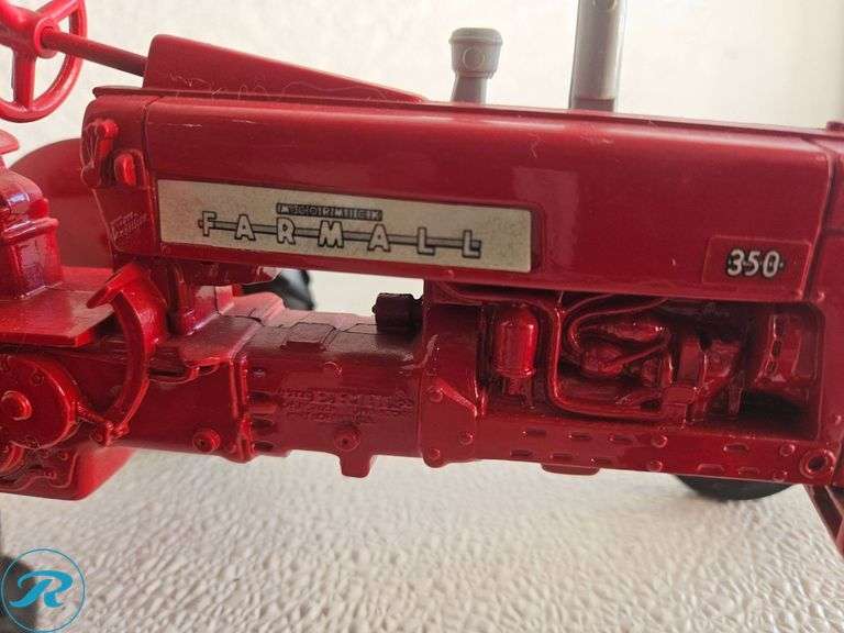 (2) Diecast Model Tractors: McCormick Farmall and International 350 Tractor Models - Roller Auctions