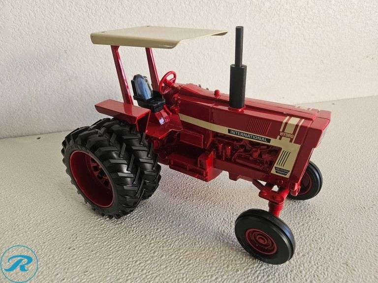 (2) Die-Cast Model Tractors: Models International 100 Hydro Farming and Cockshutt 1950-T - Roller Auctions