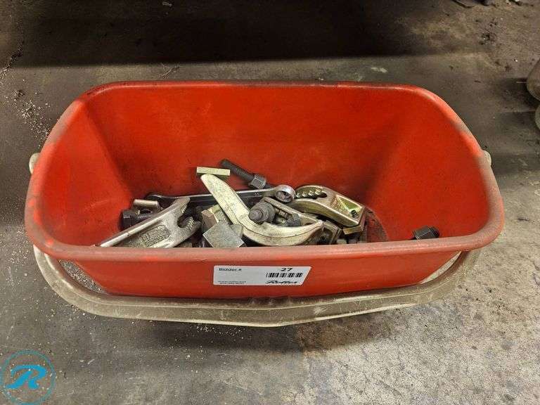 Metal Hardware and Clamping Components in Red Plastic Bin