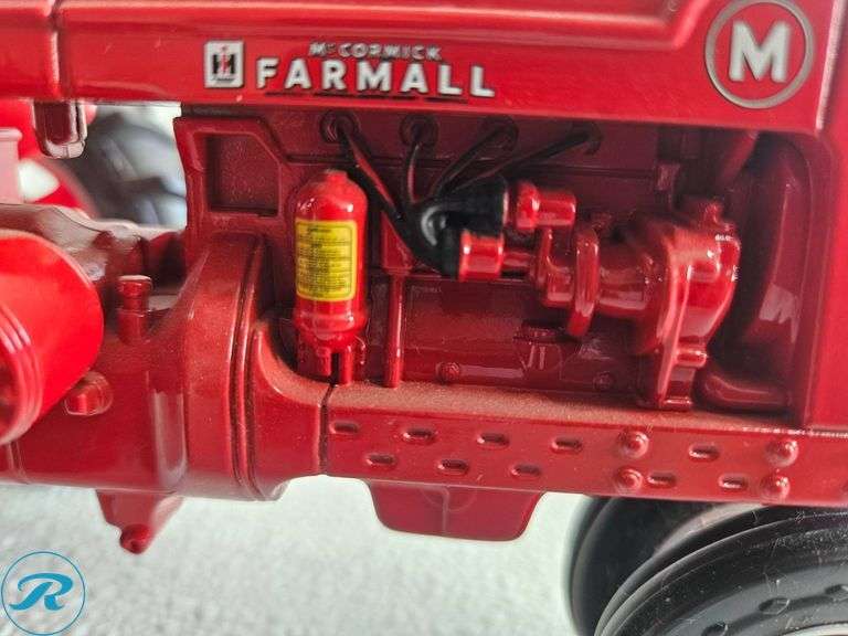 (2) Diecast Model Tractors: McCormick Farmall and Ford Tractor - Roller Auctions