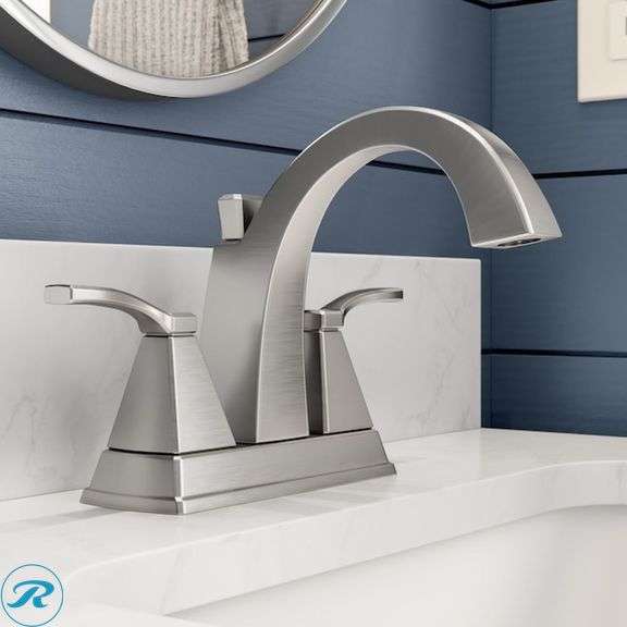 (1) New- Delta Flynn Stainless 4-in Centerset 2-handle WaterSense Mid-arc Residential Handle Bathroom Sink Faucet with Drain - Roller Auctions